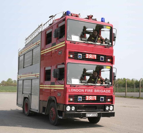 Cartoon: london fire brigade (medium) by tanerbey tagged london,fire,brigade,bus,england